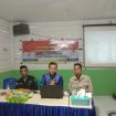 Pj. Kades Banua Adolang Irfan Syahril,S. IP.MM, Memberikan Sambutan di Dampingi,P3MD,Ketua BPD Dalam Acara Musdes Revitalisasi BUMDes Di Aula Kantor Desa Kamis 09/05/2025.