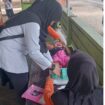 Foto Petugas Puskesmas Sedan Memeriksa Balita di Poyandu, untuk memastikan  tidak berdampak Stunting, Posyandu Desa Banua Sendana. 